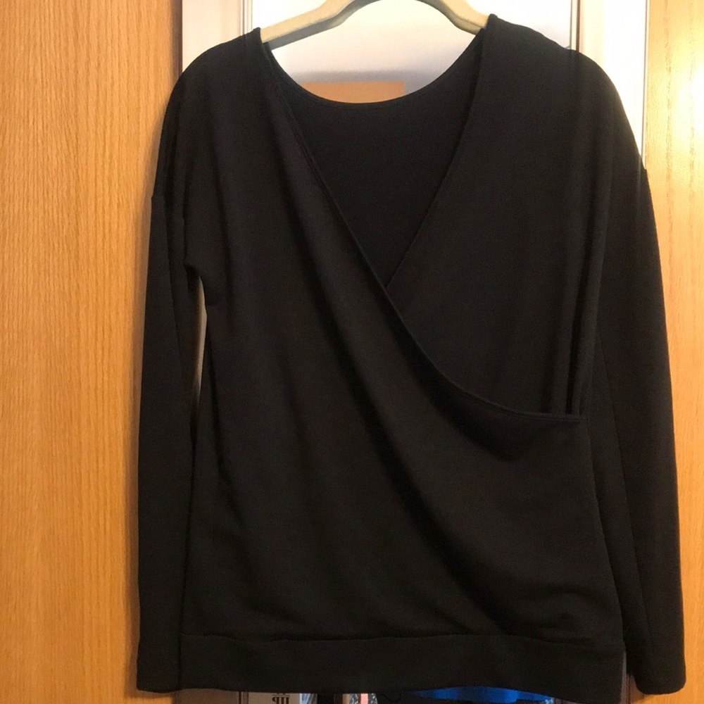 Black Gap XS cross over long sleeve blouse.  Stretchy with waistband